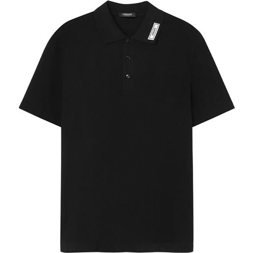 Versace polo a maniche corte con applicazione - nero