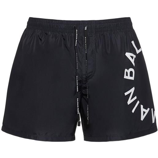 BALMAIN shorts mare in techno con logo