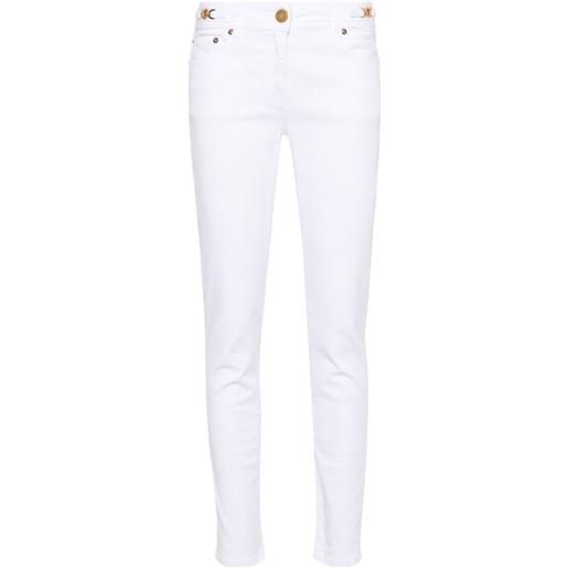 Versace jeans skinny con placca medusa - bianco