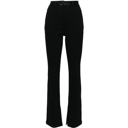 Nanushka pantaloni slim a coste - nero