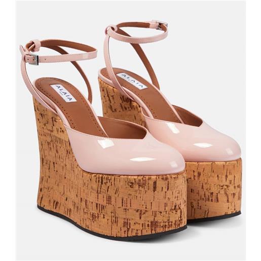 Alaia alaã¯a pumps in vernice con zeppa
