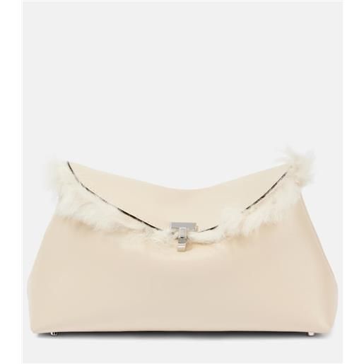 Toteme clutch t-lock in pelle con shearling