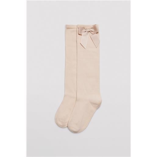 Ysabel Mora calzino lungo da bambino con dettaglio fiocco beige