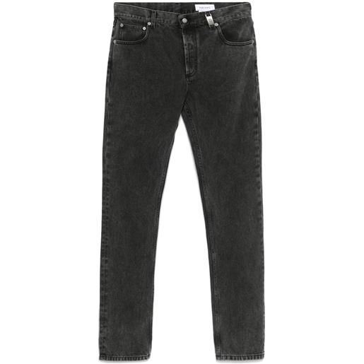 Alexander McQueen jeans con placca logo - grigio