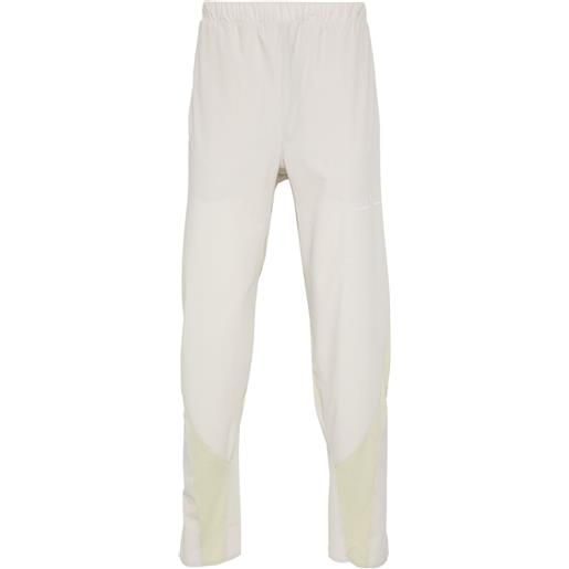 On Running pantaloni sportivi faction x post archive - toni neutri