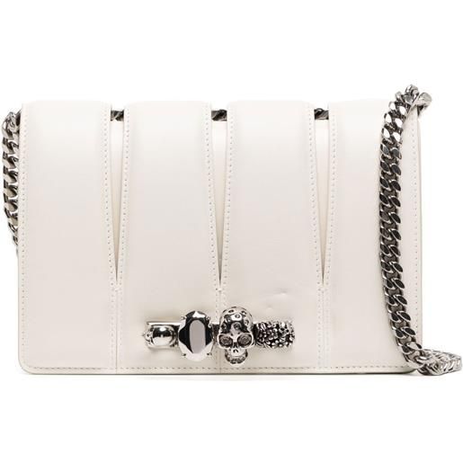 Alexander McQueen borsa a tracolla slash con borchie - bianco