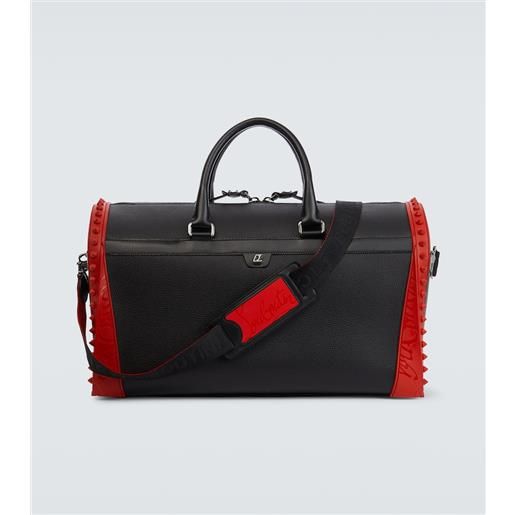 Christian Louboutin borsa da viaggio sneakender in pelle con borchie