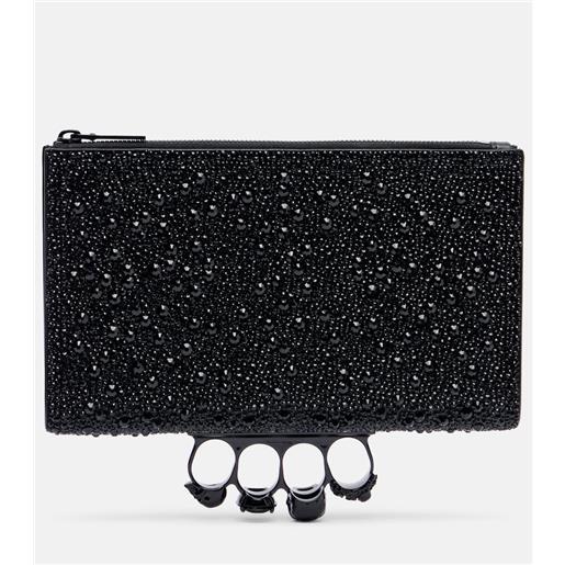 McQueen bustina skull knuckle in pelle con borchie