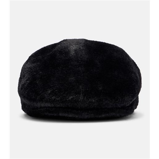 Ruslan Baginskiy coppola con logo