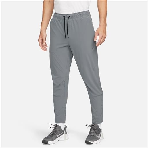 Nike pantaloni versatili con zip sul bordo dri-fit Nike unlimited - uomo - grigio