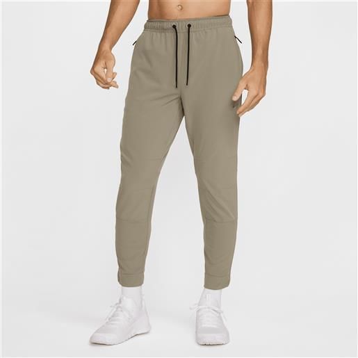 Nike pantaloni versatili con zip sul bordo dri-fit Nike unlimited - uomo - verde