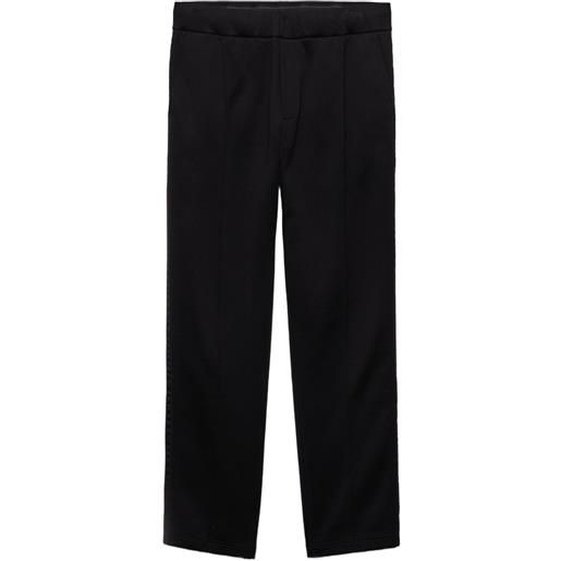 Prada pantaloni con placca logo - nero