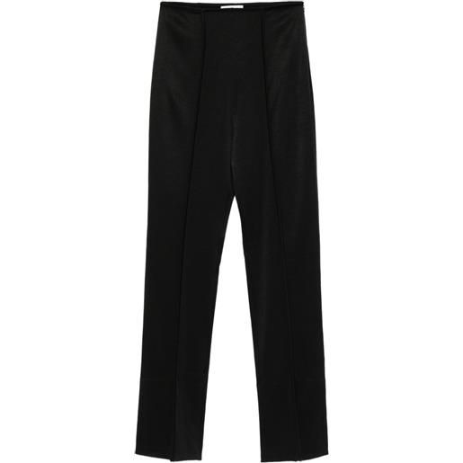Nanushka pantaloni con righe laterali - nero