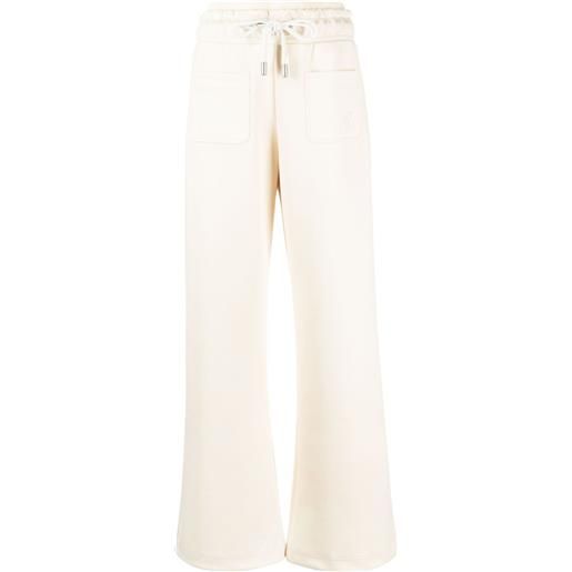 Off-White pantaloni sportivi svasati con ricamo - giallo