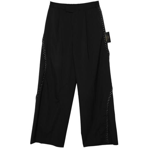 Undercover pantaloni con stampa - nero